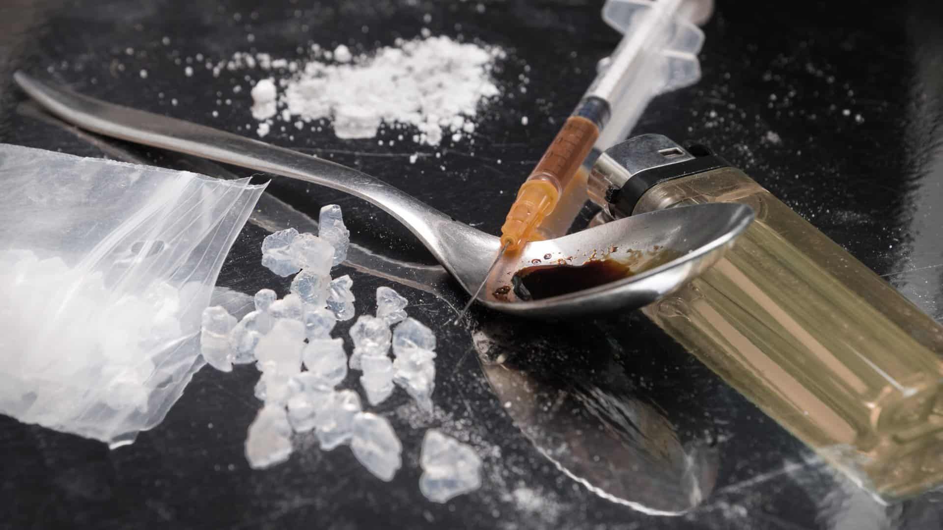 heroin and other drugs representing opioid addiction