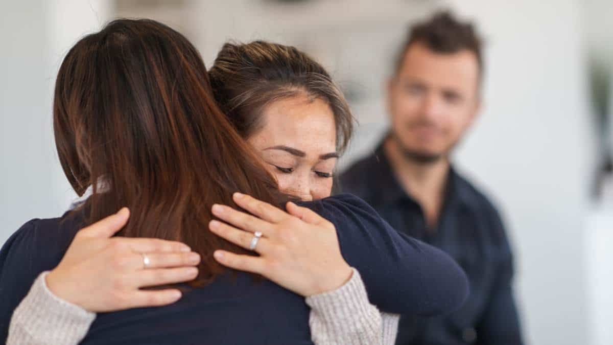 Patient hugging loved one during rehab in Chattanooga, TN.