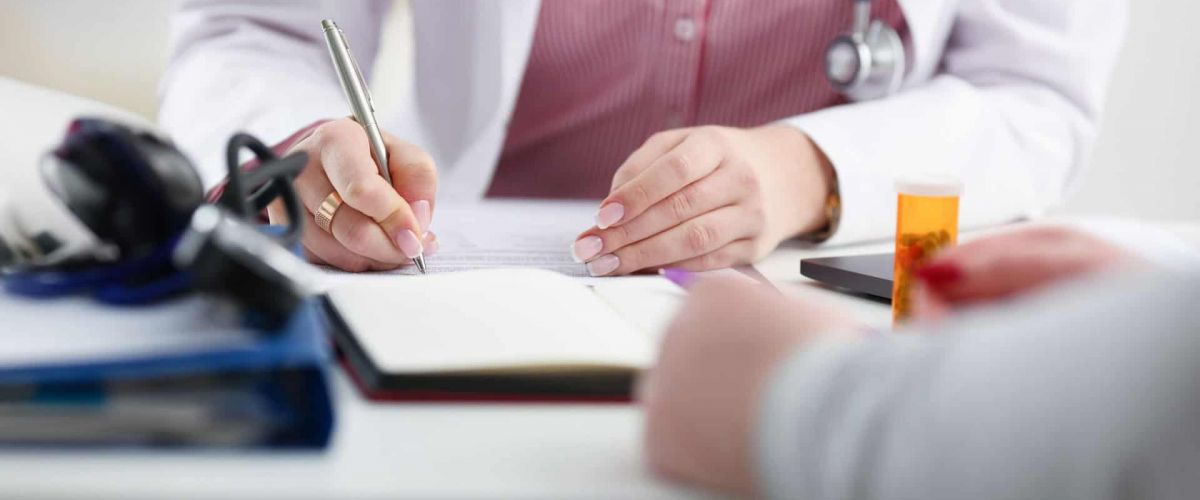 doctor prescribes medications for medication-assisted treatment