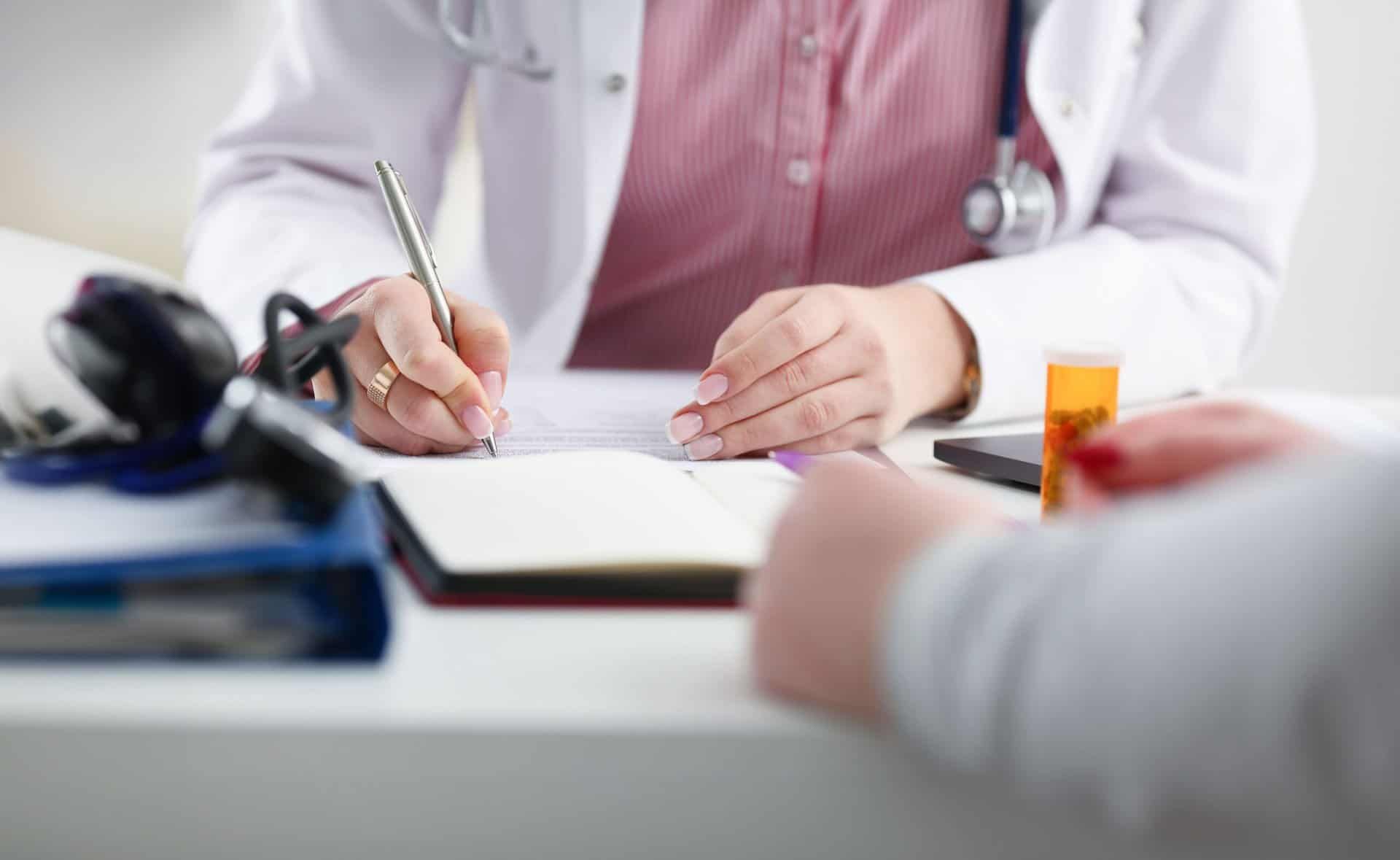 doctor prescribes medications for medication-assisted treatment