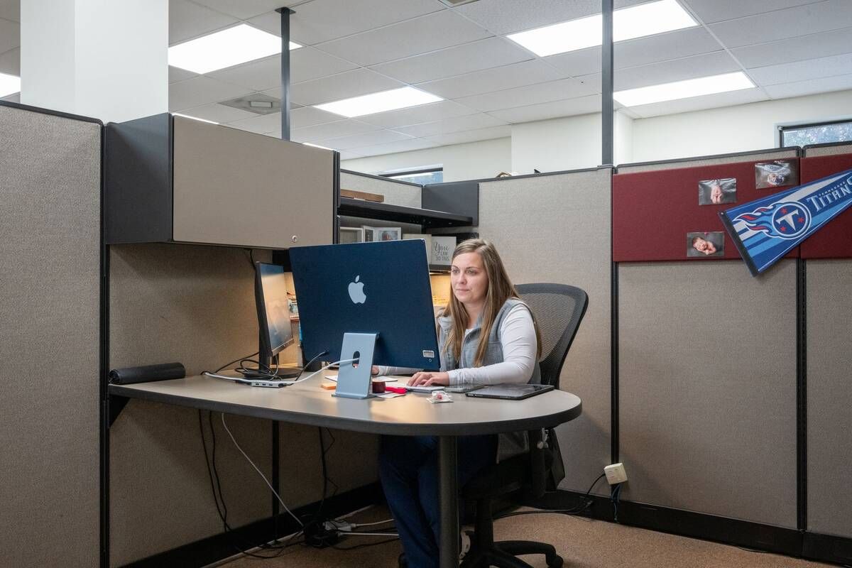 Hard alcohol being poured into a glasses