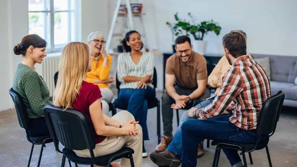 People sharing valuable experiences during a group therapy session at rehab in Chattanooga, TN.