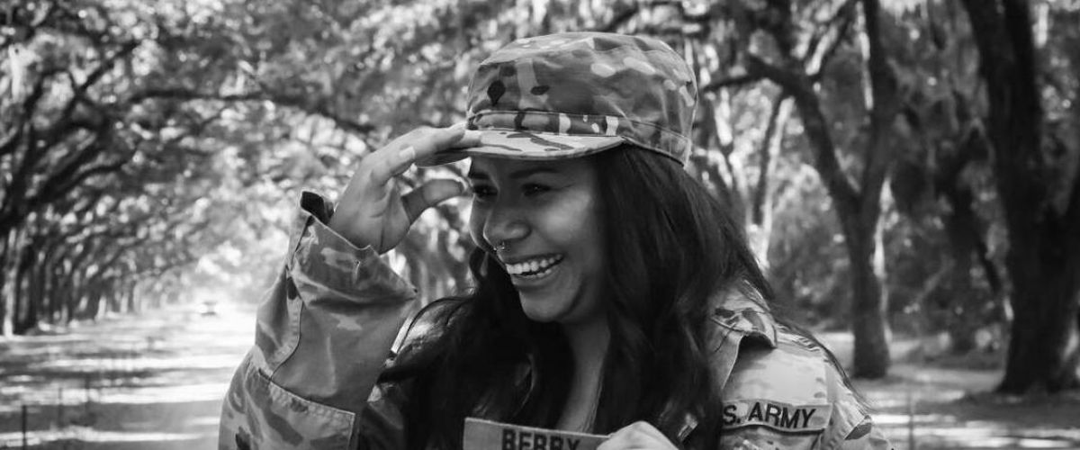 Military women smiling as she is getting treatment for mental health