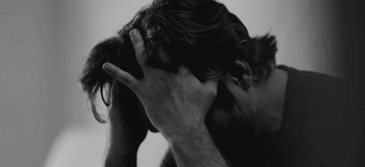 man struggles with substance misuse